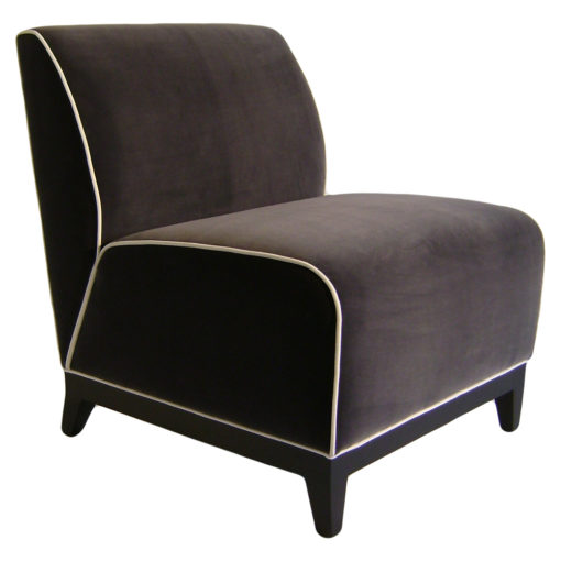 Julie armless Lounge chair with gray upholstery and white welting along side edges and black wood legs.