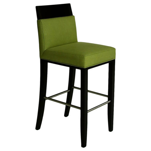 Austin barstool upholstered in green with wooden legs and foot rails.