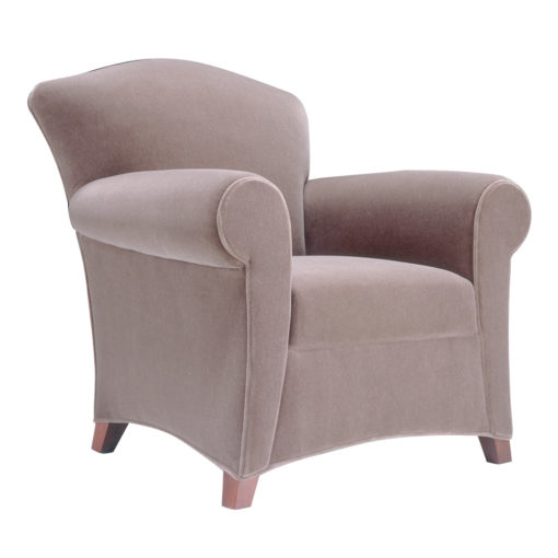 Royal Lounge Chair with pale pink upholstery and wood legs.