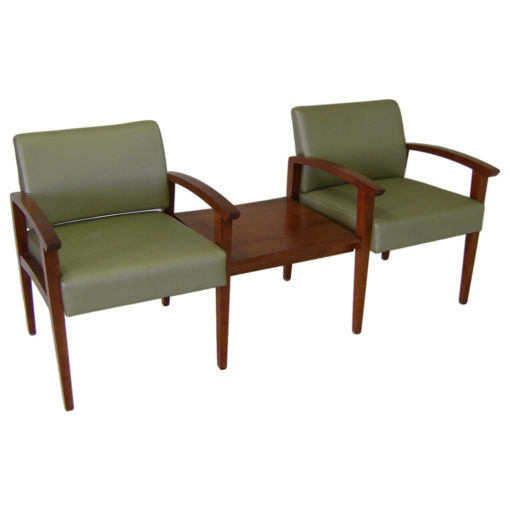 Sovereign seating in green upholstery with connected table