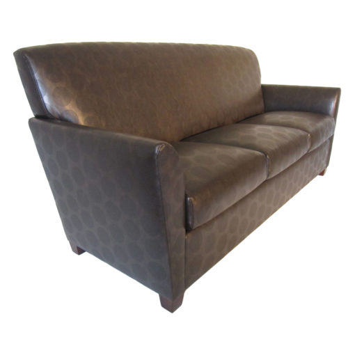 Travis Lounge Sofa with brown upholstery and wood legs.