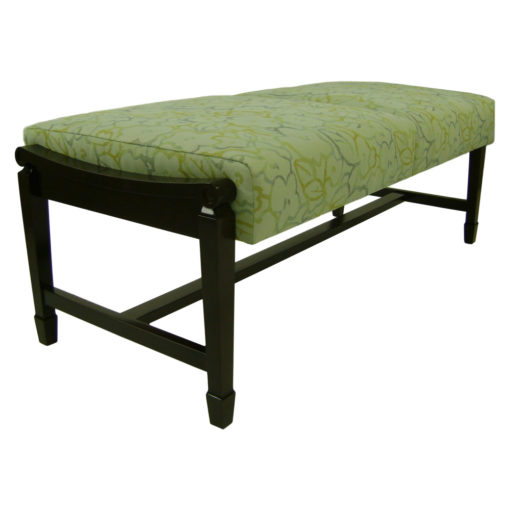 Winston Double Bench with a green upholstery and dark wood legs.