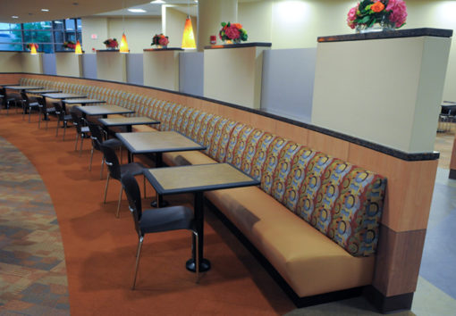 BD4 Banquette with tan upholstery in a dining cafeteria.