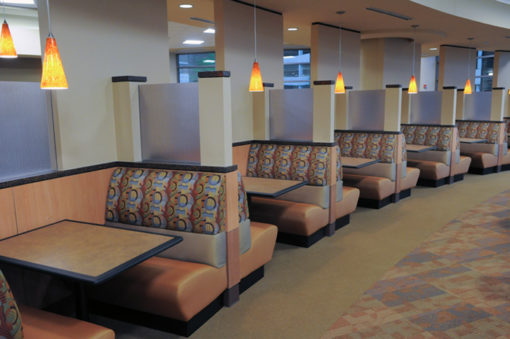 BD4 Booth with tan upholstery in a dining cafeteria.