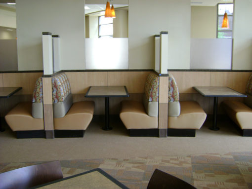 BD4 Booth with tan upholstery in a dining cafeteria.