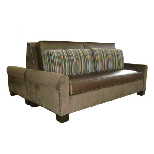 Double sided banquette with brown leather upholstered seats, fitted pillows on back with a nail head trim along outer edge; Rio Vista banquette