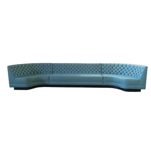 Lightly colored teal banquette with tufted back; Seville Banquette