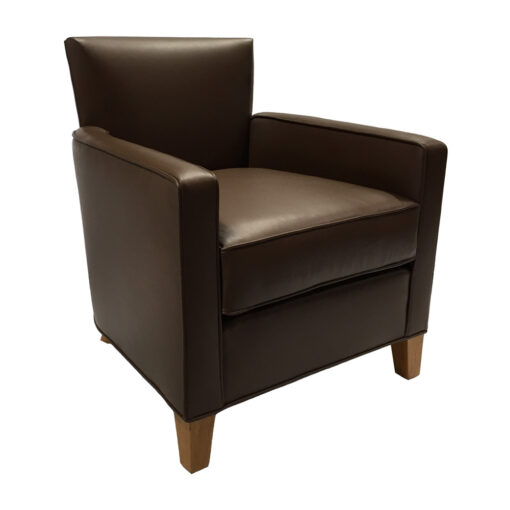 Granger lounge chair upholstered in brown leather with wooden feet.