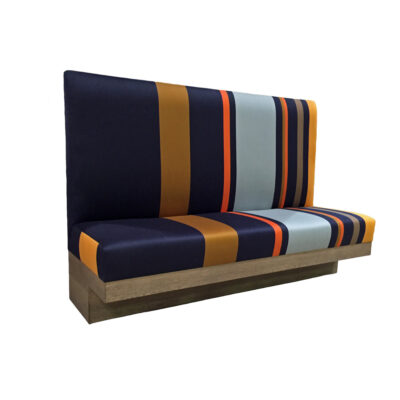 Boldly patterned stripes of dark blue, gold, orange, light blue and tan Wilson Banquette