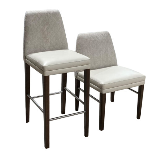 Waco barstool next to the waco pull up chair, both with cream leather seats and a light grey upholstery on the backs